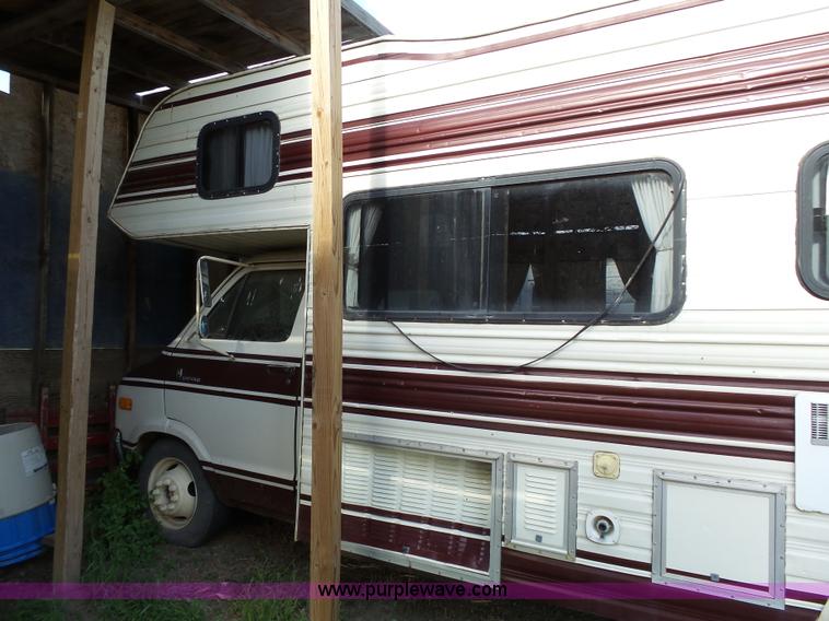 image for item J4114 1979 Dodge Brougham Coach Sportsman camper