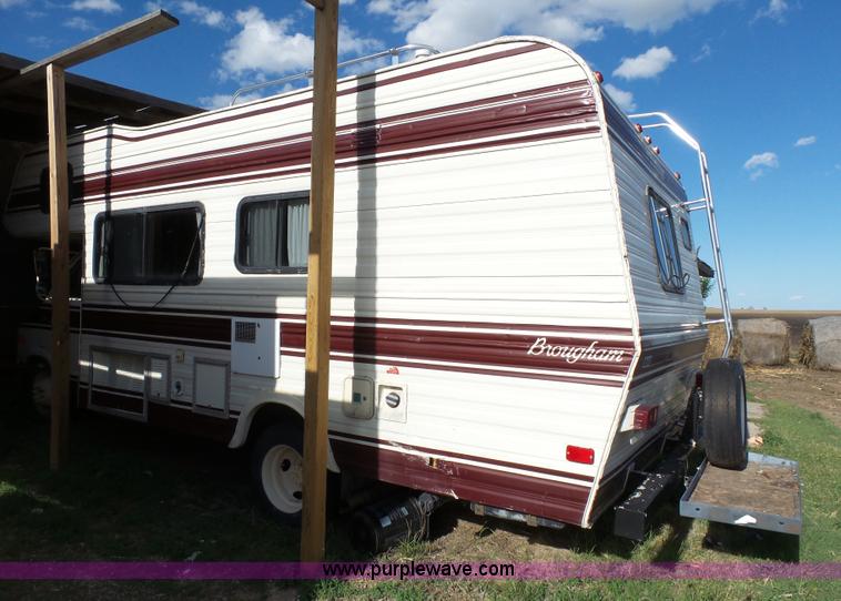 image for item J4114 1979 Dodge Brougham Coach Sportsman camper