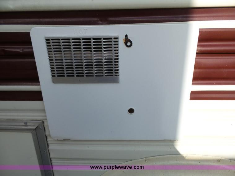 image for item J4114 1979 Dodge Brougham Coach Sportsman camper