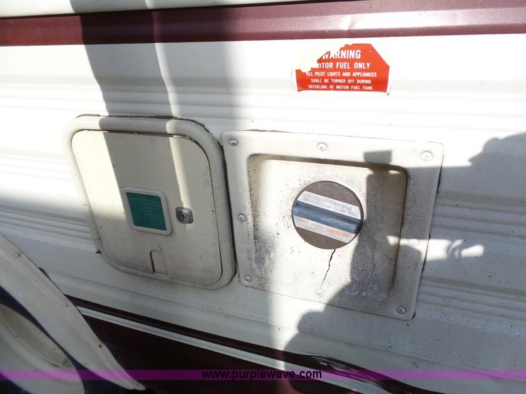 image for item J4114 1979 Dodge Brougham Coach Sportsman camper