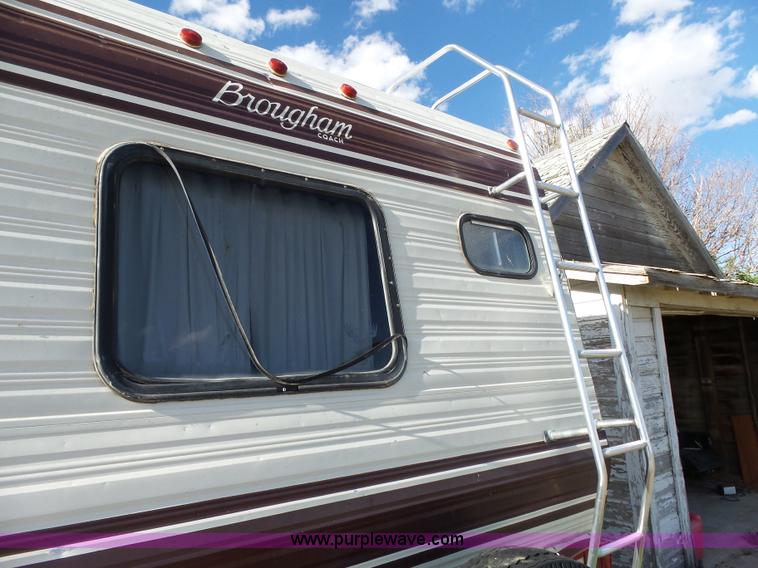 image for item J4114 1979 Dodge Brougham Coach Sportsman camper