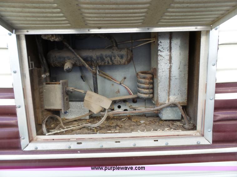 image for item J4114 1979 Dodge Brougham Coach Sportsman camper