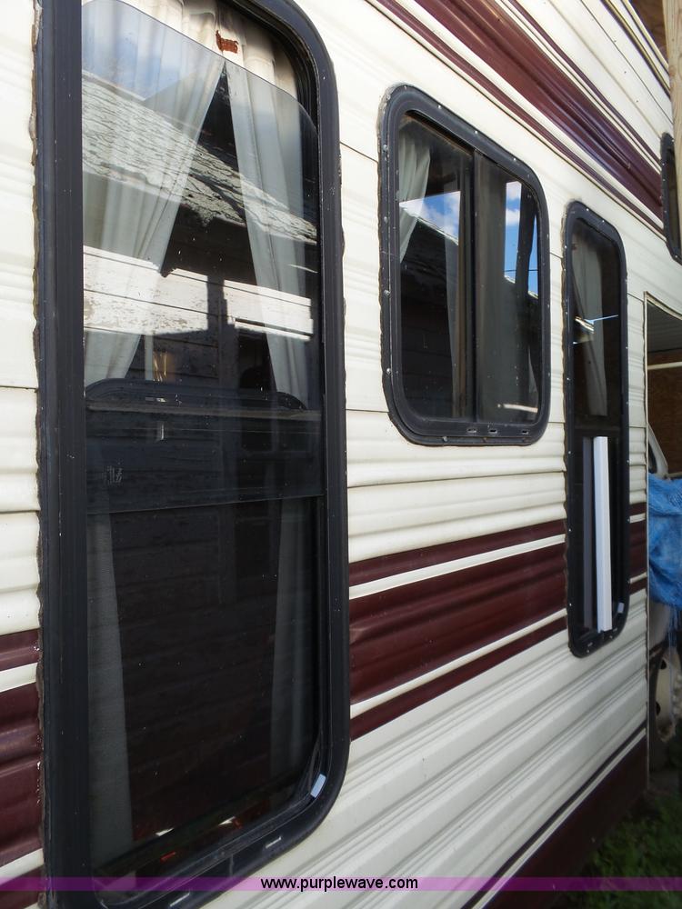 image for item J4114 1979 Dodge Brougham Coach Sportsman camper