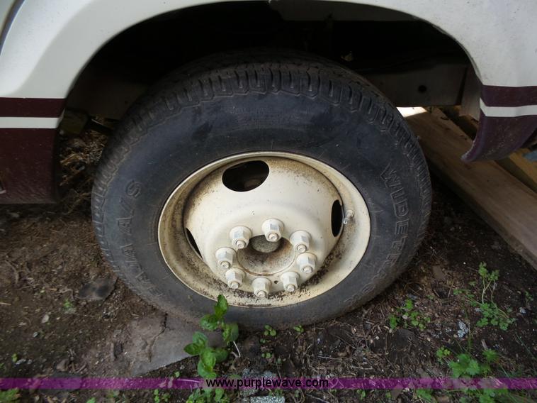 image for item J4114 1979 Dodge Brougham Coach Sportsman camper