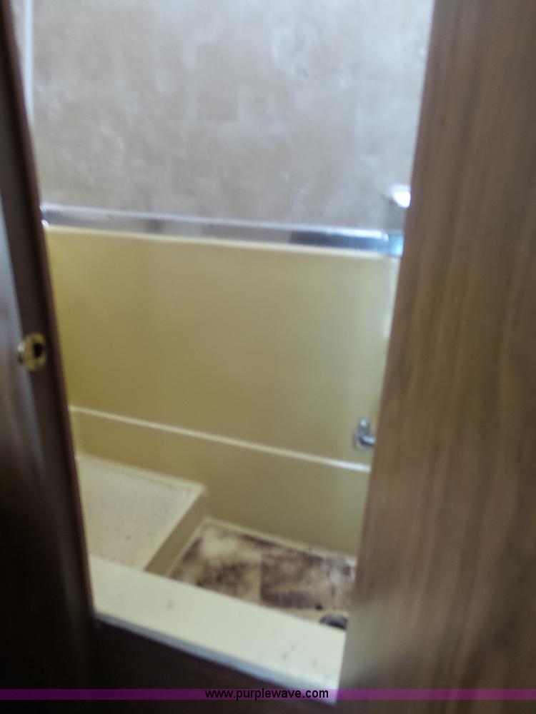 image for item J4114 1979 Dodge Brougham Coach Sportsman camper