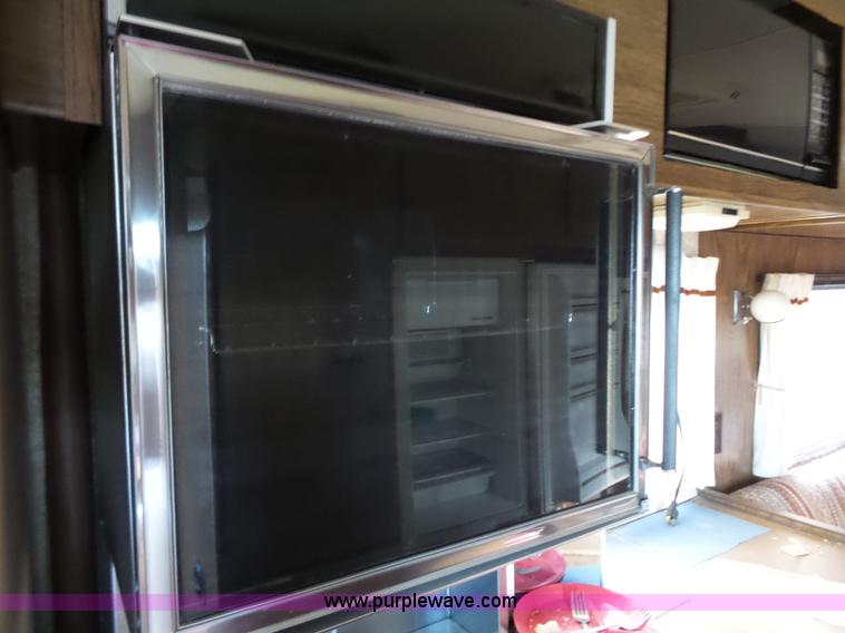 image for item J4114 1979 Dodge Brougham Coach Sportsman camper