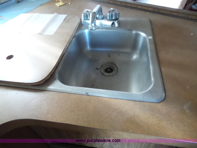 image for item J4114 1979 Dodge Brougham Coach Sportsman camper