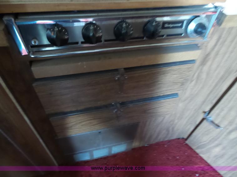 image for item J4114 1979 Dodge Brougham Coach Sportsman camper