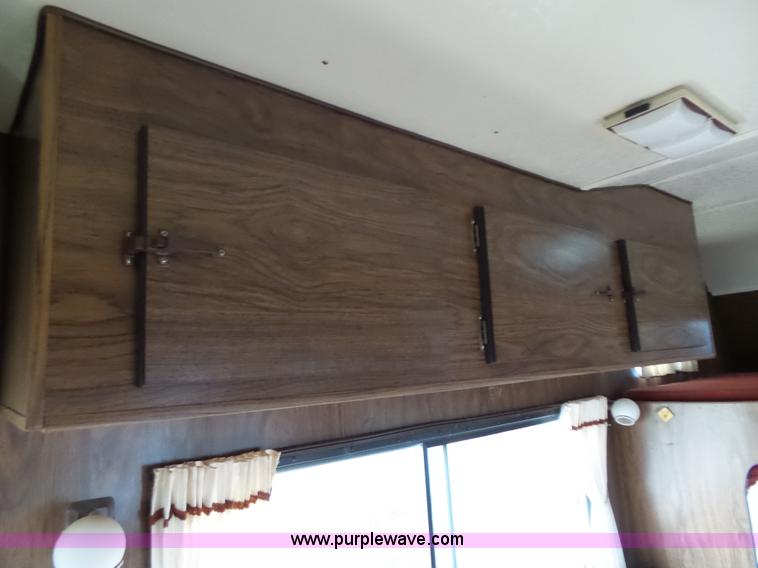 image for item J4114 1979 Dodge Brougham Coach Sportsman camper