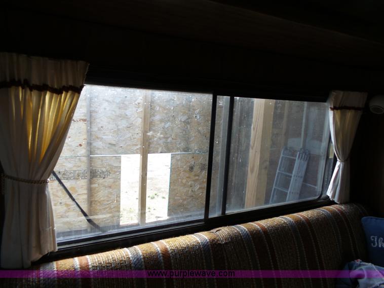 image for item J4114 1979 Dodge Brougham Coach Sportsman camper