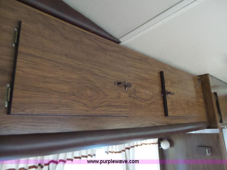 image for item J4114 1979 Dodge Brougham Coach Sportsman camper