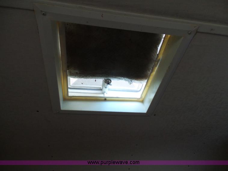 image for item J4114 1979 Dodge Brougham Coach Sportsman camper