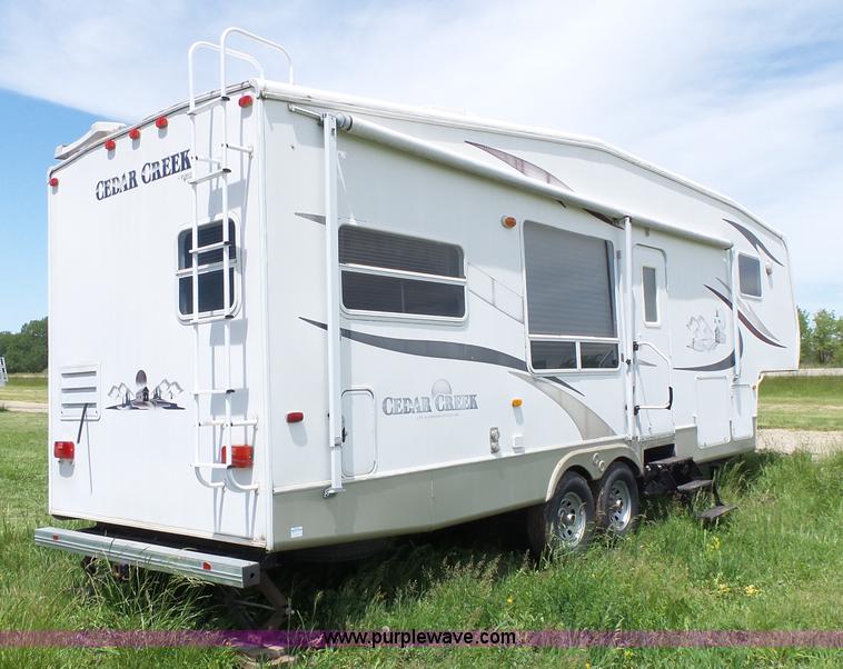 image for item J4949 2004 Cedar Creek camper