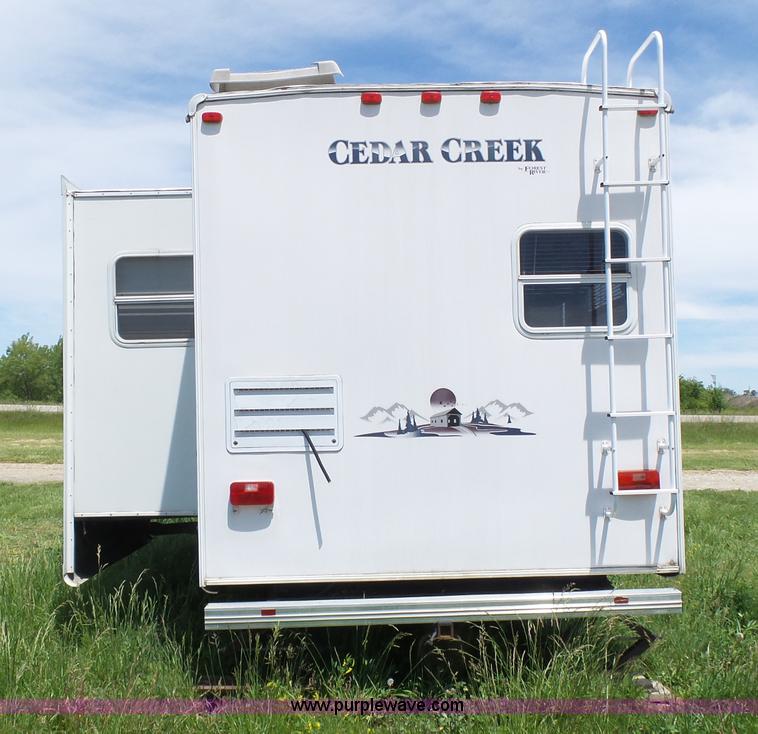 image for item J4949 2004 Cedar Creek camper