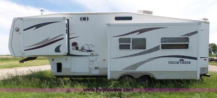 image for item J4949 2004 Cedar Creek camper