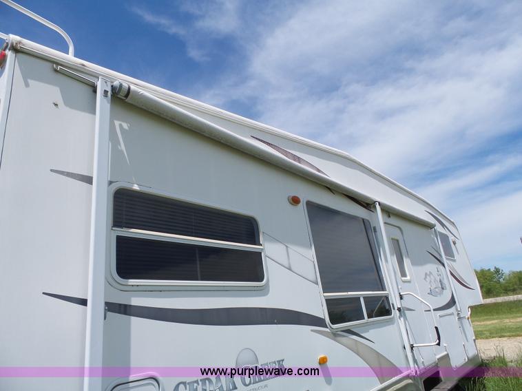 image for item J4949 2004 Cedar Creek camper