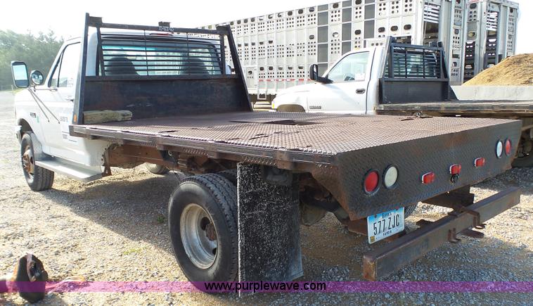 image for item K4056 1997 Ford F350 flatbed pickup truck