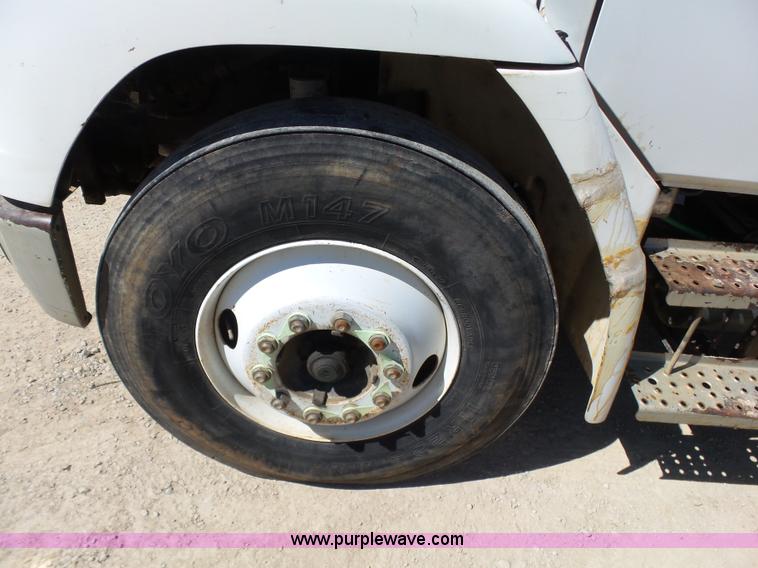 image for item K7186 1996 Freightliner FL70 digger derrick truck