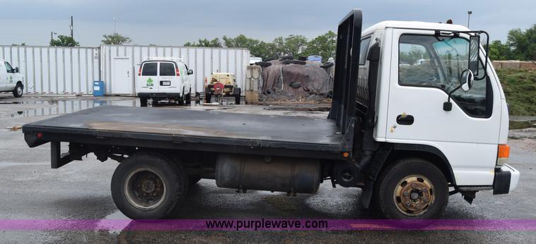 image for item K7343 1997 Isuzu NPR flatbed truck