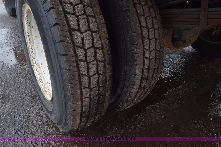 image for item K7343 1997 Isuzu NPR flatbed truck