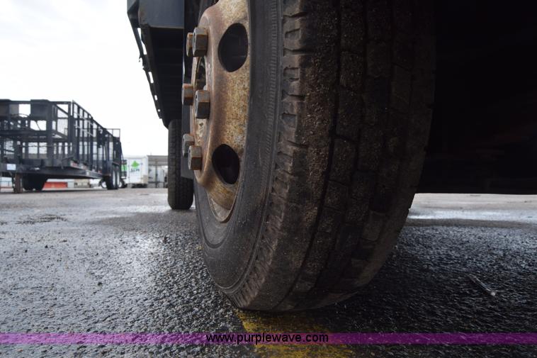 image for item K7343 1997 Isuzu NPR flatbed truck