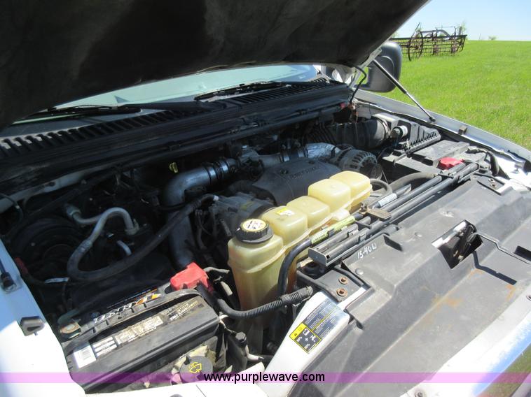 image for item K7868 2002 Ford F350 flatbed pickup truck