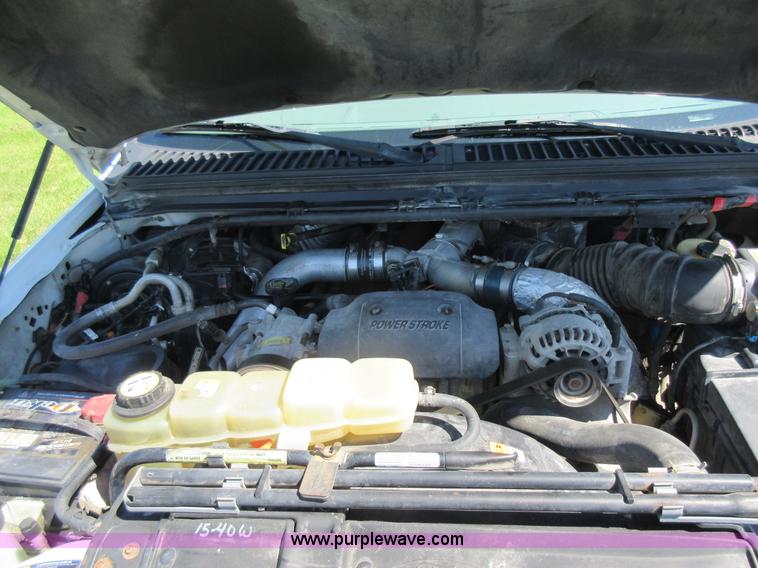 image for item K7868 2002 Ford F350 flatbed pickup truck