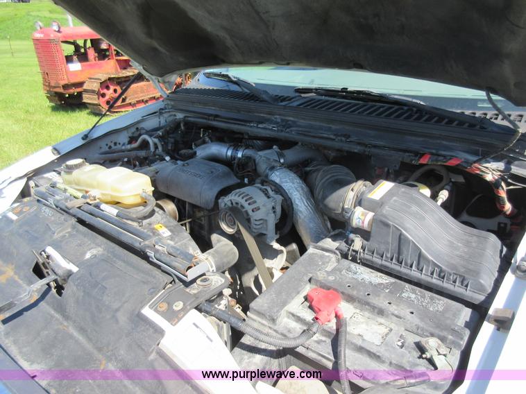 image for item K7868 2002 Ford F350 flatbed pickup truck