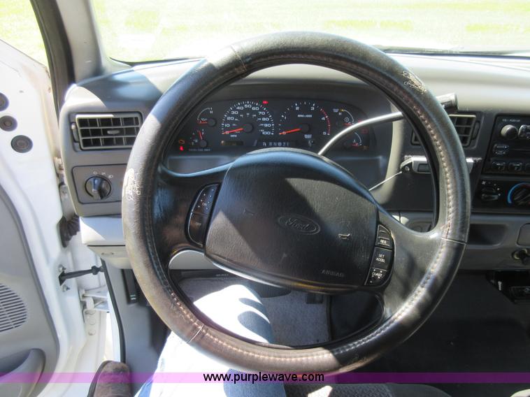 image for item K7868 2002 Ford F350 flatbed pickup truck