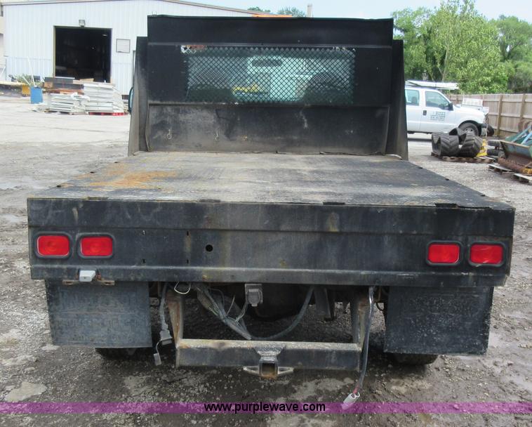 image for item K7869 2002 Ford F250 Super Duty flatbed pickup truck