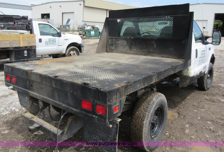image for item K7869 2002 Ford F250 Super Duty flatbed pickup truck