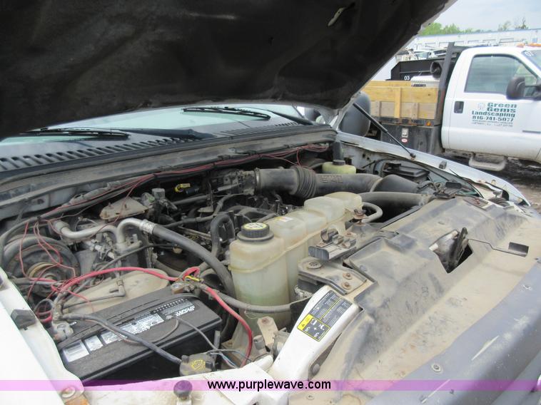 image for item K7869 2002 Ford F250 Super Duty flatbed pickup truck