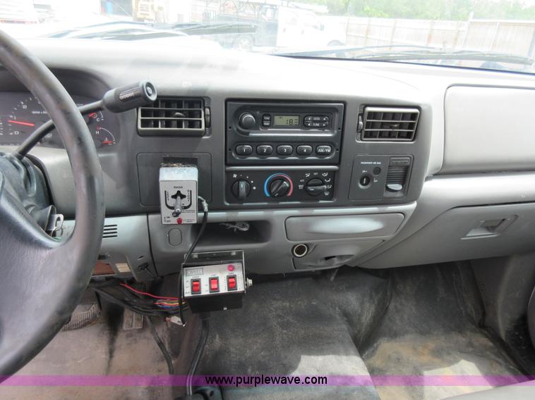 image for item K7869 2002 Ford F250 Super Duty flatbed pickup truck