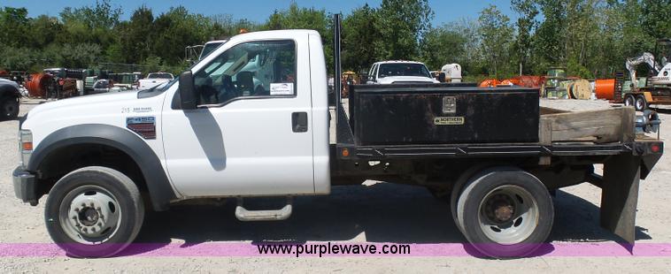 image for item K7914 2008 Ford F450 Super Duty flatbed pickup truck
