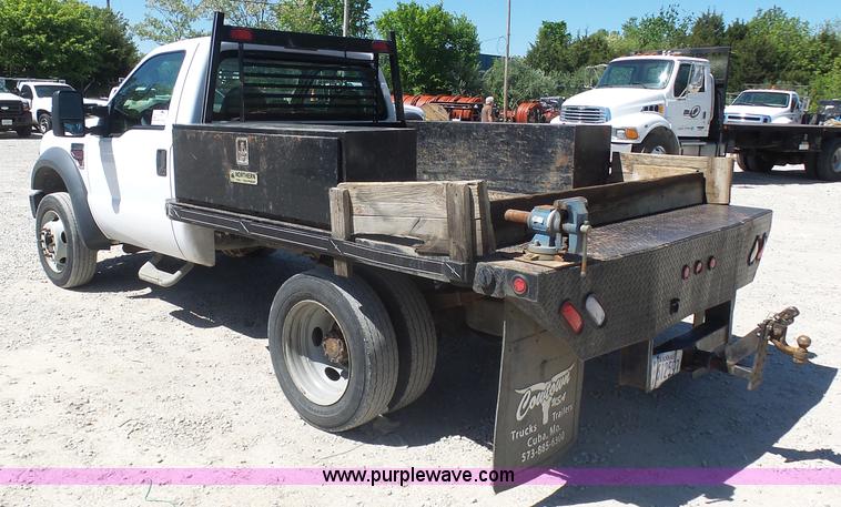 image for item K7914 2008 Ford F450 Super Duty flatbed pickup truck