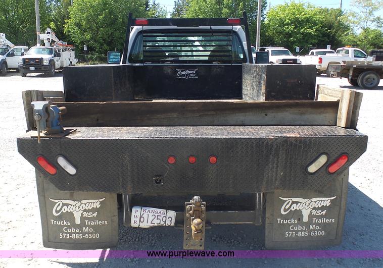 image for item K7914 2008 Ford F450 Super Duty flatbed pickup truck