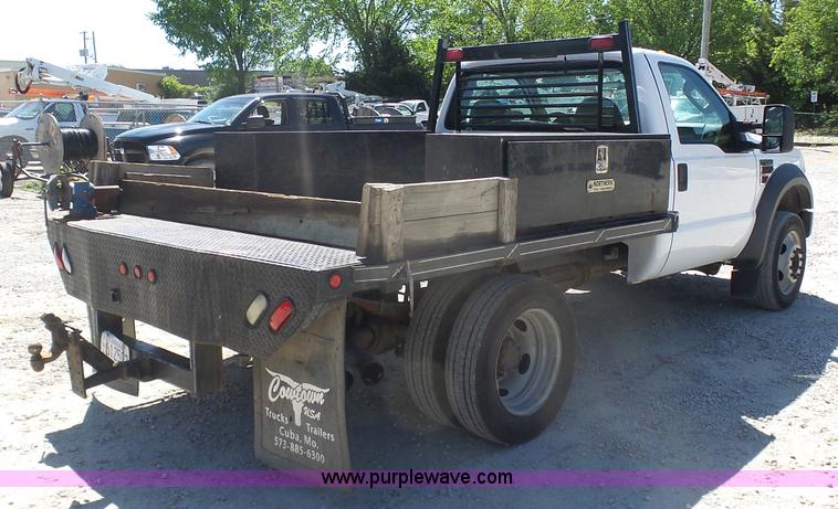 image for item K7914 2008 Ford F450 Super Duty flatbed pickup truck