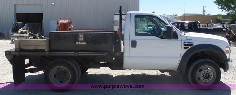 image for item K7914 2008 Ford F450 Super Duty flatbed pickup truck