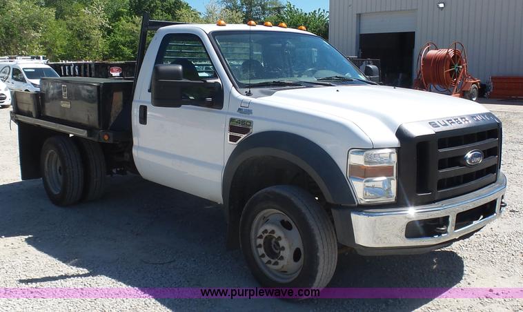 image for item K7914 2008 Ford F450 Super Duty flatbed pickup truck