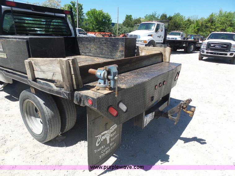 image for item K7914 2008 Ford F450 Super Duty flatbed pickup truck