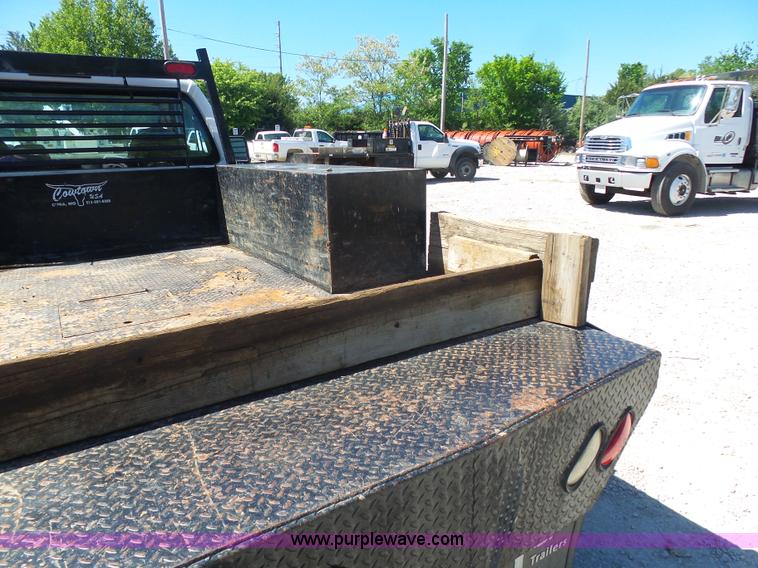 image for item K7914 2008 Ford F450 Super Duty flatbed pickup truck