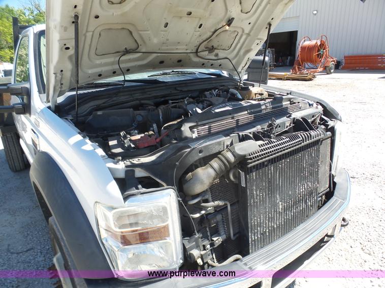 image for item K7914 2008 Ford F450 Super Duty flatbed pickup truck