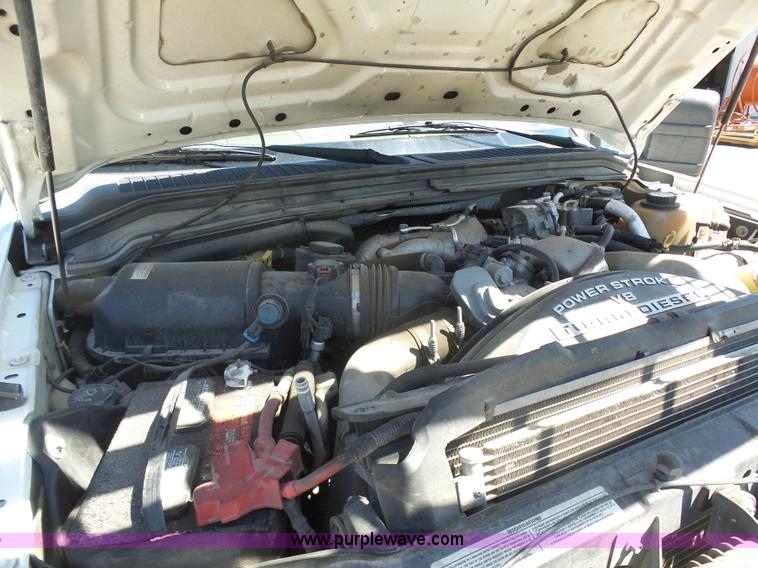 image for item K7914 2008 Ford F450 Super Duty flatbed pickup truck