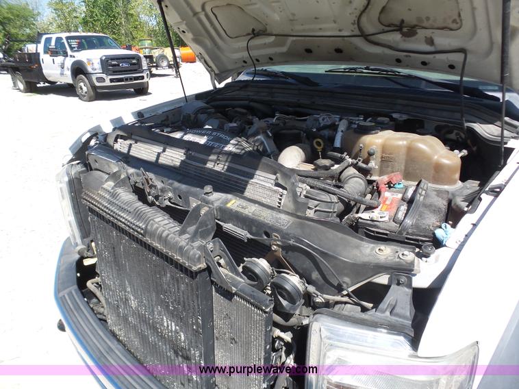 image for item K7914 2008 Ford F450 Super Duty flatbed pickup truck