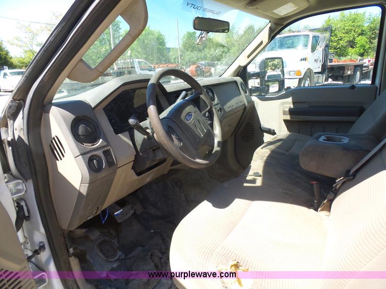 image for item K7914 2008 Ford F450 Super Duty flatbed pickup truck