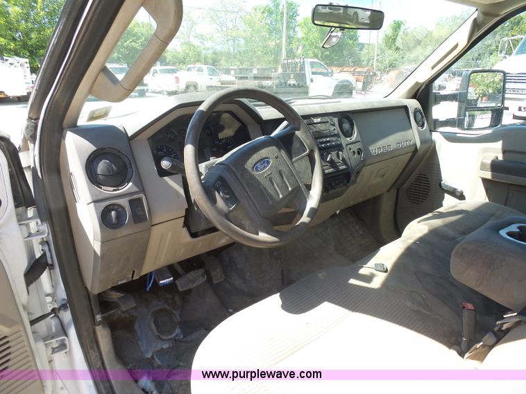 image for item K7914 2008 Ford F450 Super Duty flatbed pickup truck