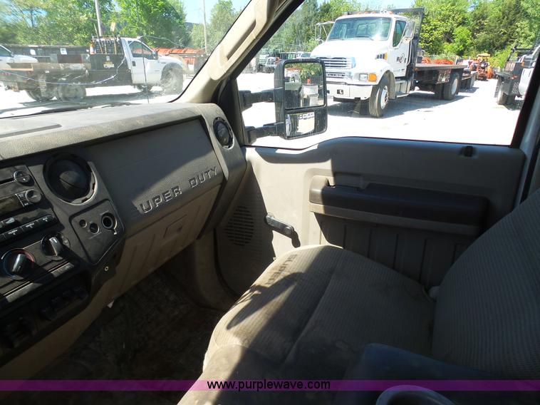 image for item K7914 2008 Ford F450 Super Duty flatbed pickup truck