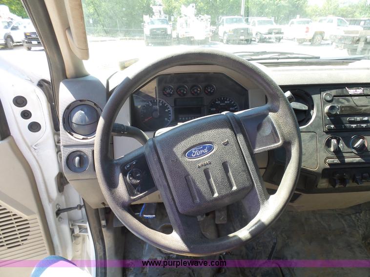 image for item K7914 2008 Ford F450 Super Duty flatbed pickup truck