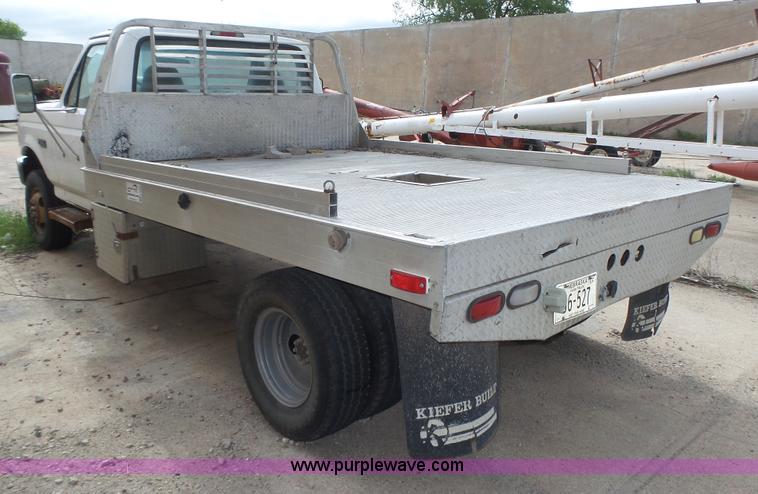 image for item K8295 1997 Ford F350 XL flatbed pickup truck