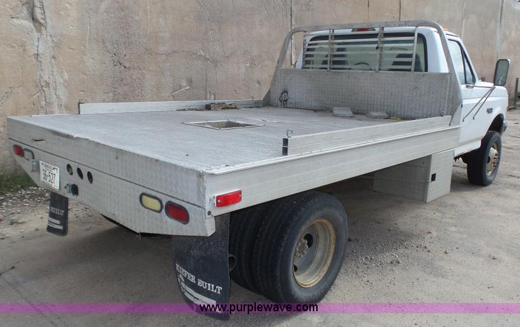 image for item K8295 1997 Ford F350 XL flatbed pickup truck